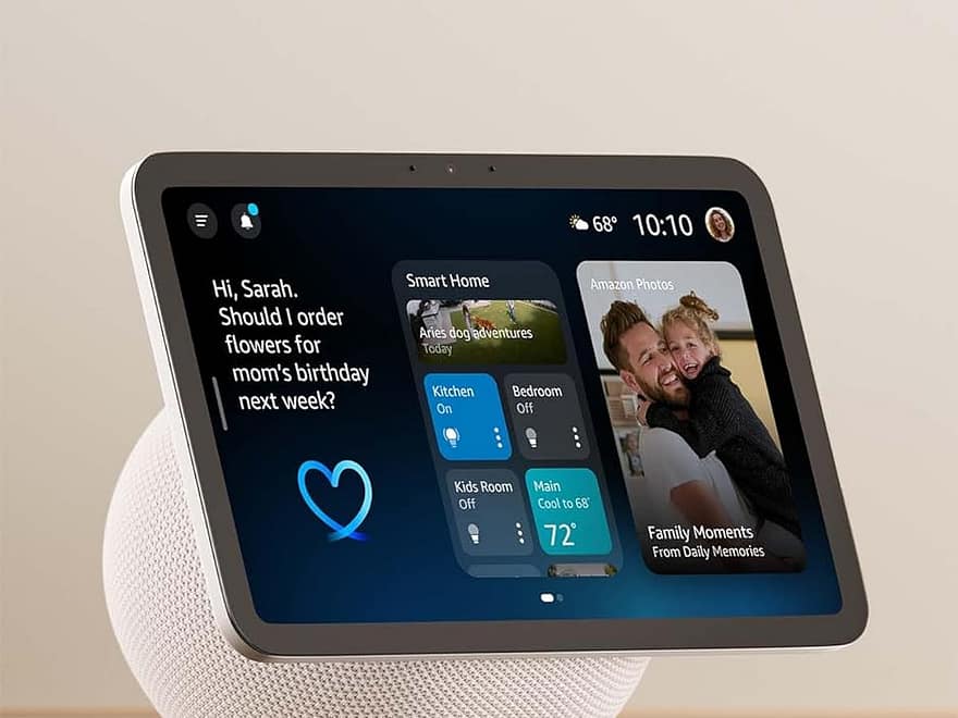 Amazon Echo Show 8 (newest model) smart display with spatial audio, white fabric base and angled 8.7-inch screen showing Alexa dashboard on tabletop