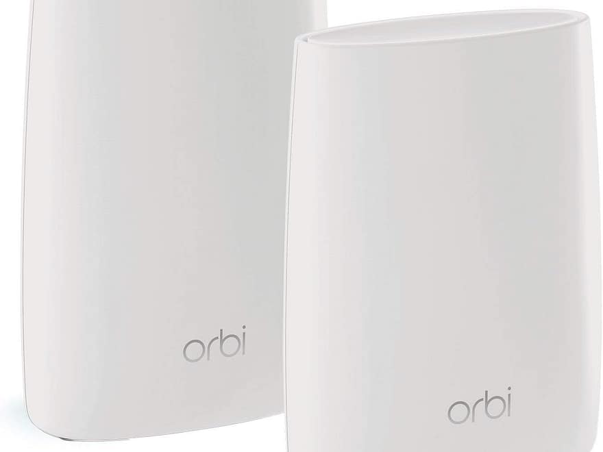 NETGEAR Orbi Home Mesh WiFi System RBK50 with two white rounded router units and blue top ring indicator